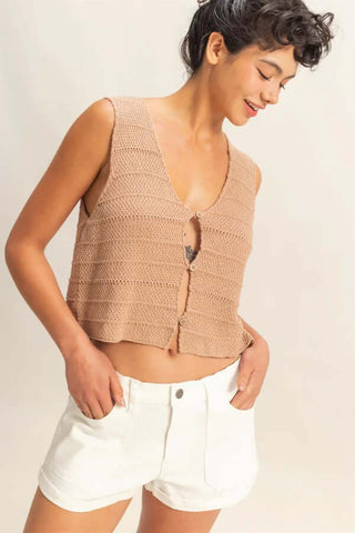 Trendy crochet button-front vest top available in two colors, perfect for layering in any season.