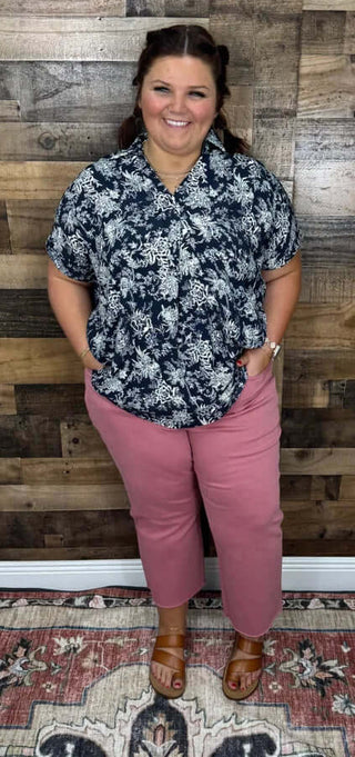 Alt text: "Judy Blue 88983 Dusty Rose Cropped Wide Leg Jeans displayed on hanger against a neutral background.