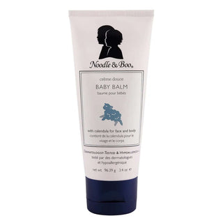 Noodle & Boo Baby Balm in all sizes with elegant packaging on a soft pink background.