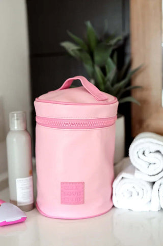 Jadelynn Brooke Pink Barrel Toiletry Bag - Self Love Club, featuring vibrant design and spacious interior for travel essentials.