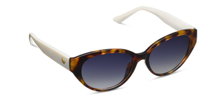 Tortoiseshell cat-eye sunglasses with white arms and gradient blue lenses.
