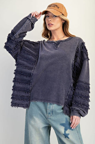 Women's oversized long sleeve top in washed terry, featuring fringe stripe contrast, available in three colors.