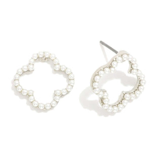Silver & Pearl Studded Hollow Clover Stud Earrings on display, showcasing an elegant and sophisticated design.
