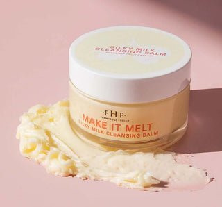 FHF Make It Melt Silky Milk Cleansing Balm in jar with lid off, featuring creamy texture, for gentle makeup removal.