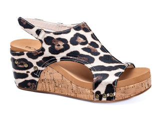 Corkys Gold Leopard Carley Wedge Sandal displaying a chic animal print design with a comfortable wedge heel. Final Sale item.