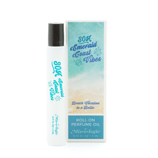 AMI Emerald Coast Mixologie Rollerball Perfume with sleek design, reflecting luxury and coastal freshness.