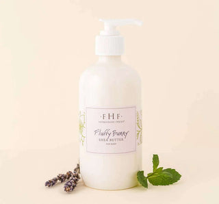 Fluffy Bunny® Shea Butter Cream - Luxurious moisturizing cream in elegant packaging for velvety-smooth, nourished skin.