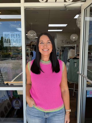 Alt Text: "Trendy pink sleeveless knit top with green trim - Bibi fashion essential
