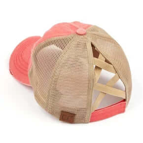 Stylish CORAL HAT Initial This Hat Bar with vibrant design on a wooden stand perfect for fashion-forward enthusiasts.
