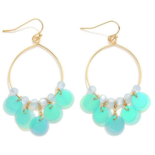 Stylish blue sequin tassel drop earrings showcasing intricate design and shimmering elegance. Perfect for elevating any outfit.