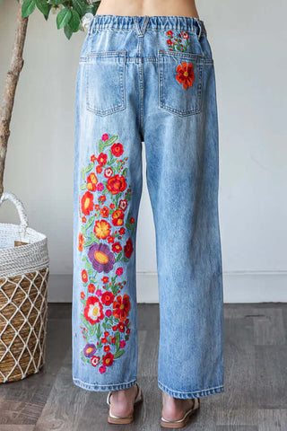 Med Wash Relaxed Fit Straight Leg Denim Jeans with red floral embroidery by Oli & Hali; stylish and comfortable fashion.