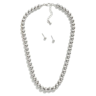Sleek silver beaded necklace with elegant design, perfect for adding sparkle to any outfit. Ideal for all occasions.