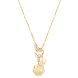 Elegant gold chain necklace with hoop pendant and charms, perfect for stylish accessorizing and statement jewelry.